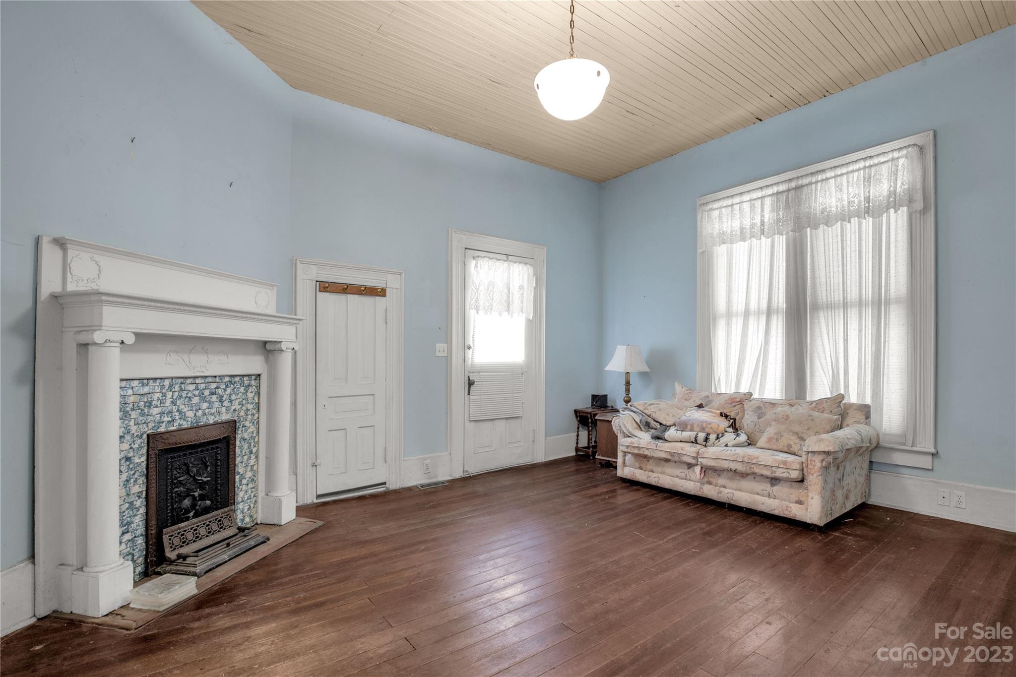 205 Walnut Street Chester, SC 29706 - Photo 18 of 32 a living room with furniture and a fireplace
