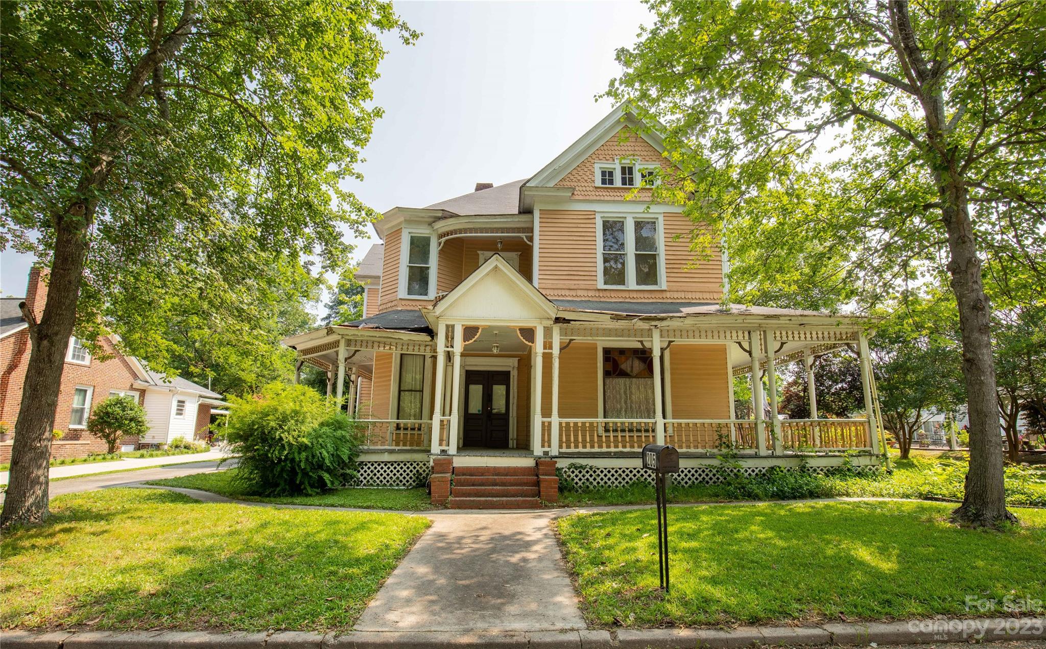 205 Walnut Street Chester, SC 29706 - Photo 2 of 32 a front view of a house with a yard
