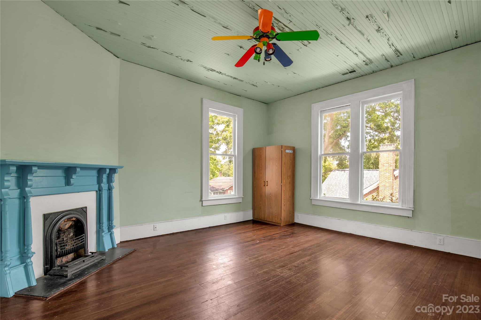205 Walnut Street Chester, SC 29706 - Photo 29 of 32 a view of an empty room with a window and wooden floor