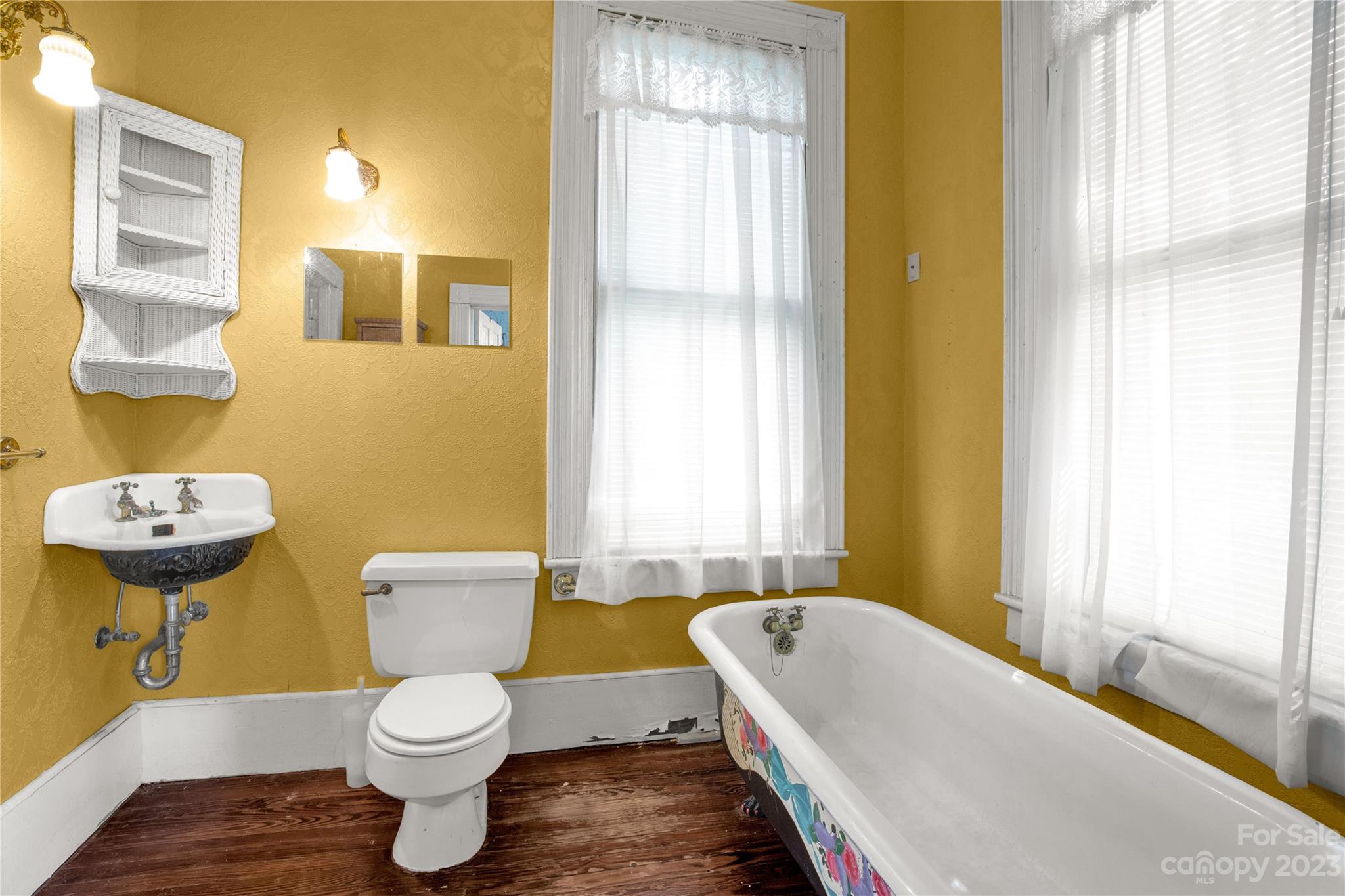 205 Walnut Street Chester, SC 29706 - Photo 32 of 32 a bathroom with a toilet a sink and a bathtub