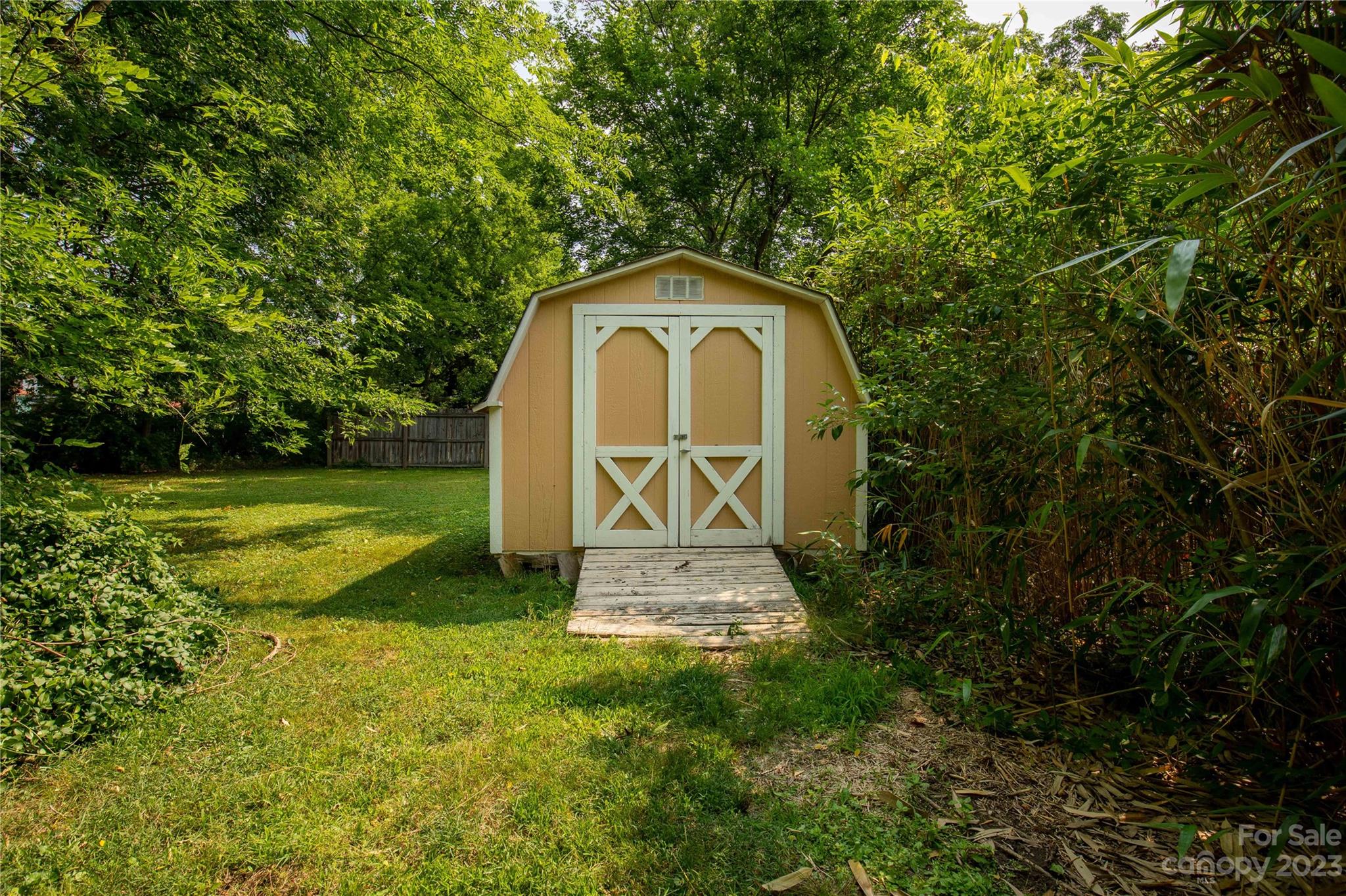 205 Walnut Street Chester, SC 29706 - Photo 9 of 32 a view of a tiny house with garden