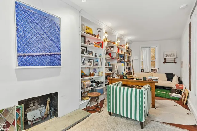 a kitchen with a sink a stove and cabinets