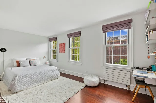 a bathroom with a double vanity sink shower and a mirror