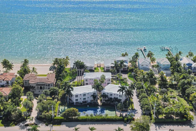 a view of yard with swimming pool and green space