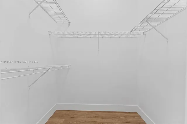 a view of a room with racks on the wall