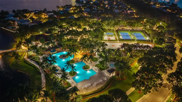 an aerial view of house with yard