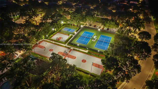 a view of a parked cars in front of a building