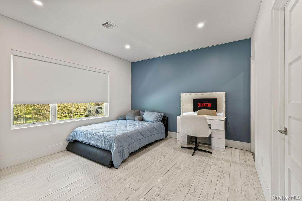 5 Bluebird Road Monsey, NY 10952 - Photo 26 of 50 a bedroom with a bed and a window