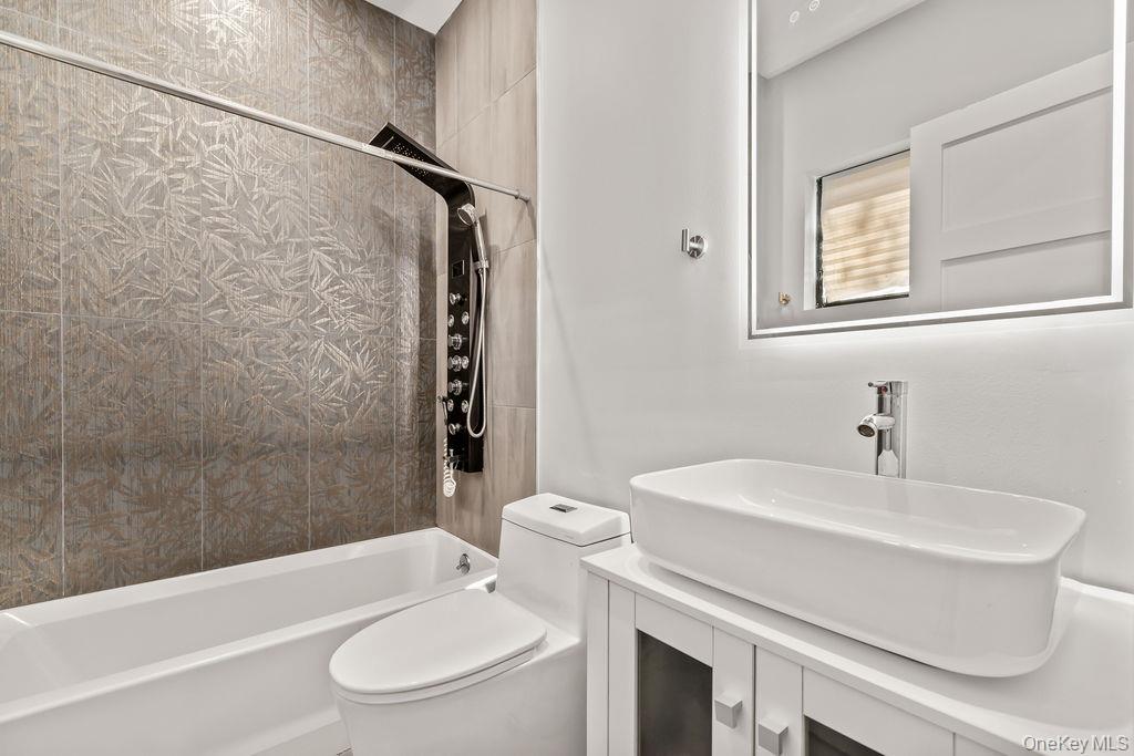 5 Bluebird Road Monsey, NY 10952 - Photo 31 of 50 a bathroom with a sink toilet and shower