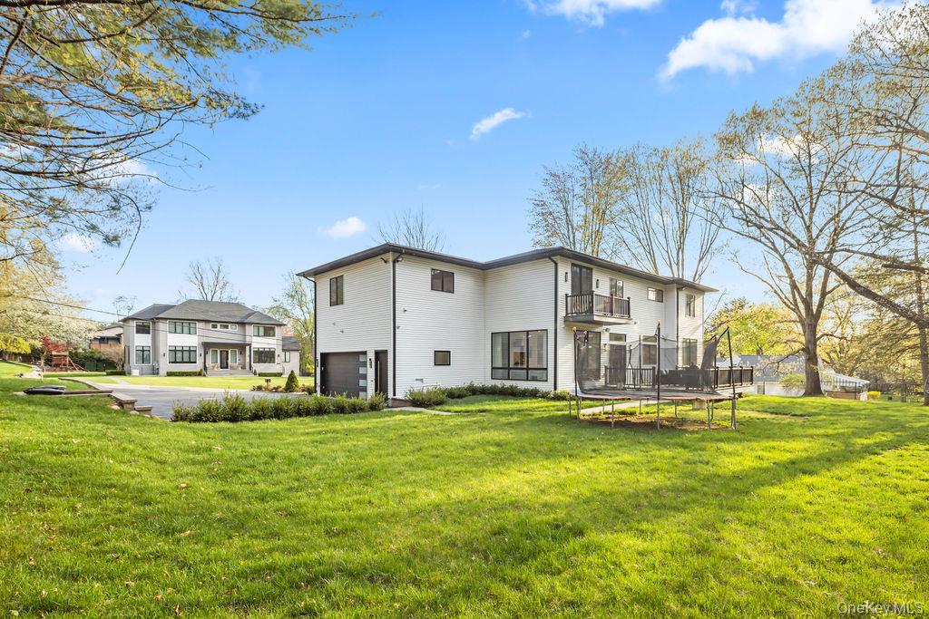 5 Bluebird Road Monsey, NY 10952 - Photo 41 of 50 a view of a house with a big yard and large trees