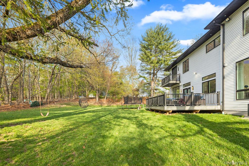 5 Bluebird Road Monsey, NY 10952 - Photo 46 of 50 a house view with swimming pool in front of it
