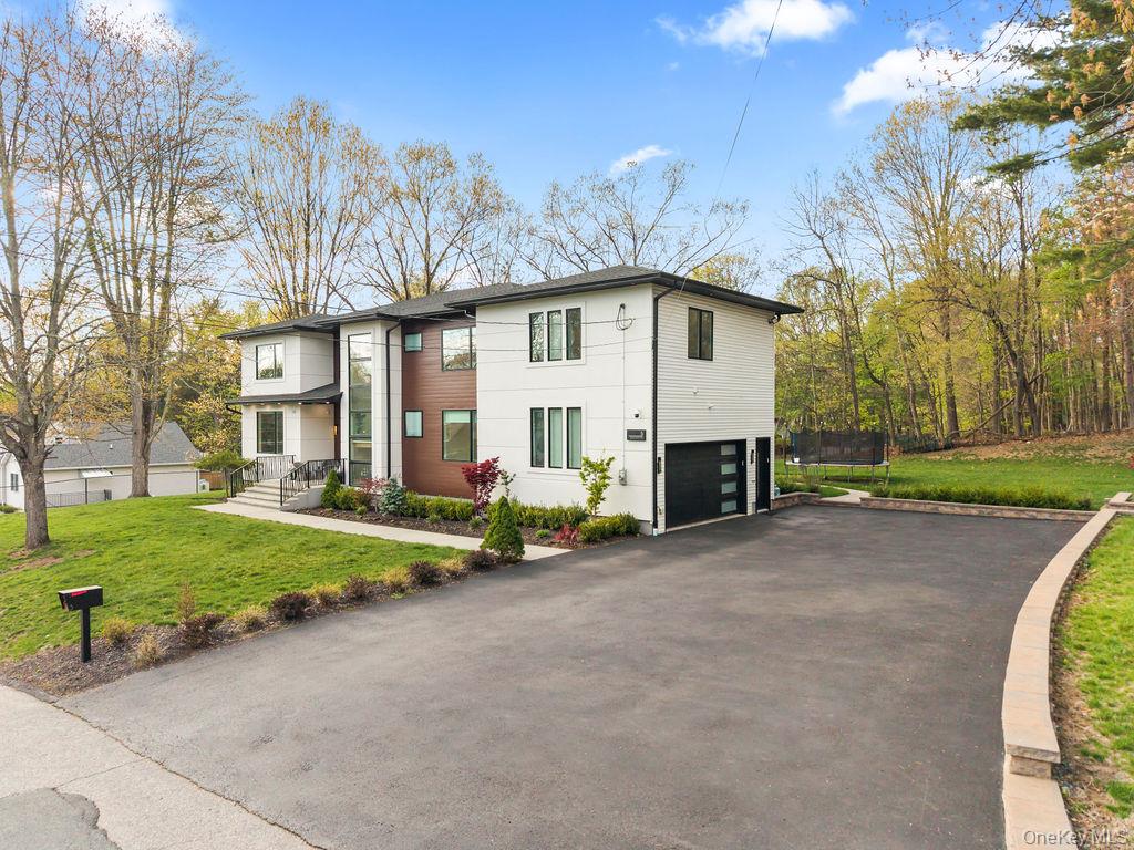 5 Bluebird Road Monsey, NY 10952 - Photo 47 of 50 a view of a house with a yard and large trees