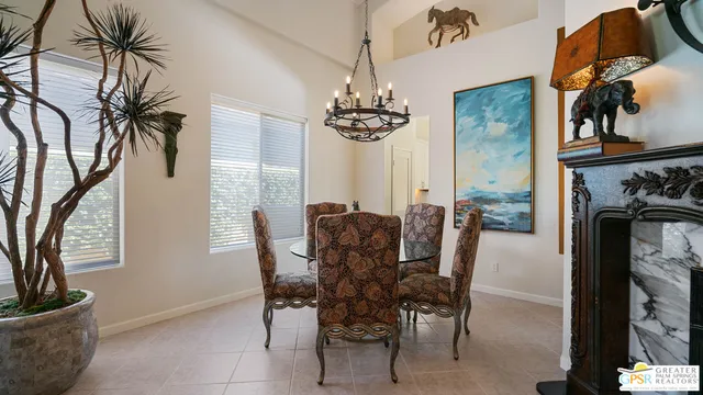 a kitchen with stainless steel appliances granite countertop a stove top oven a refrigerator a sink and dishwasher