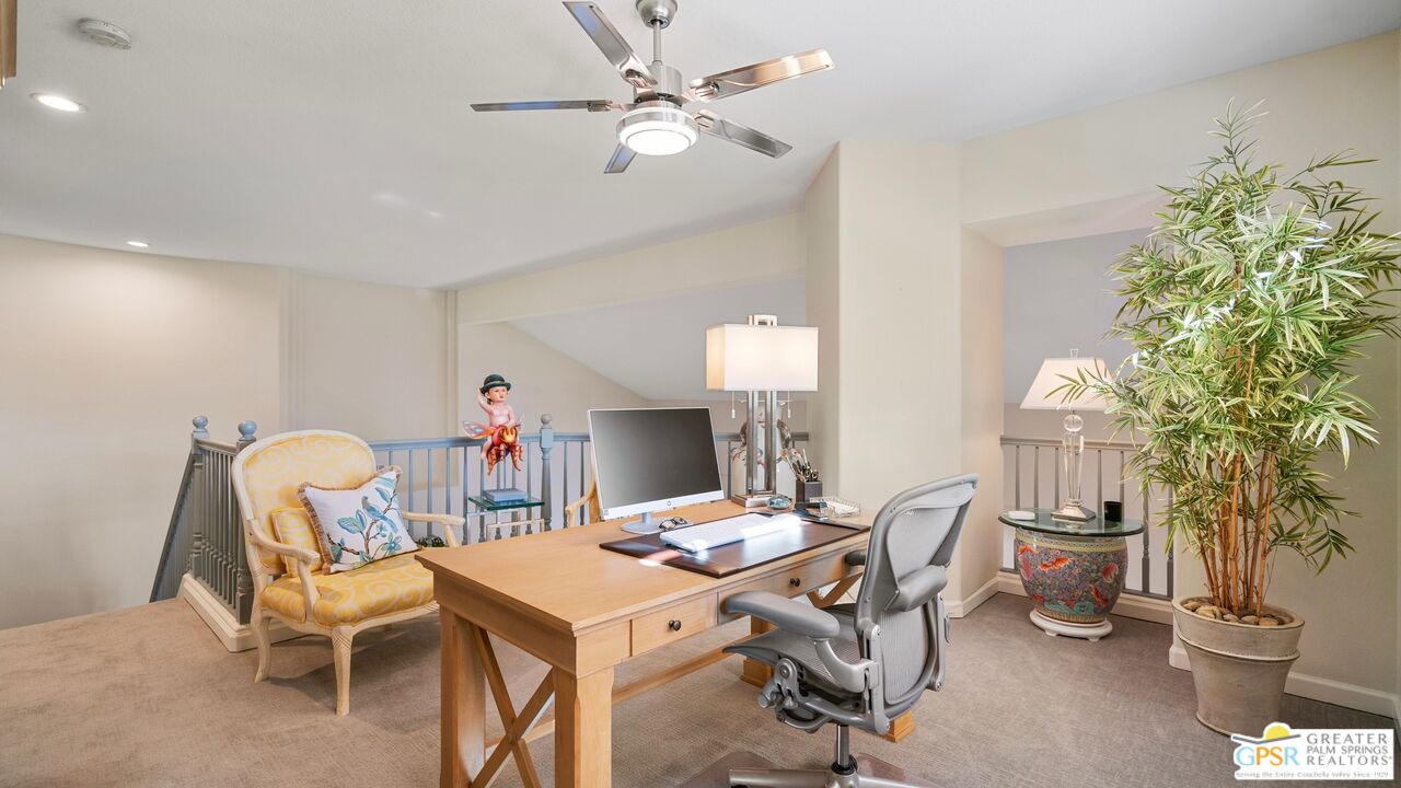 72 North Kavenish Drive Rancho Mirage, CA 92270 - Photo 32 of 73 a view of a dining room with furniture and a potted plant