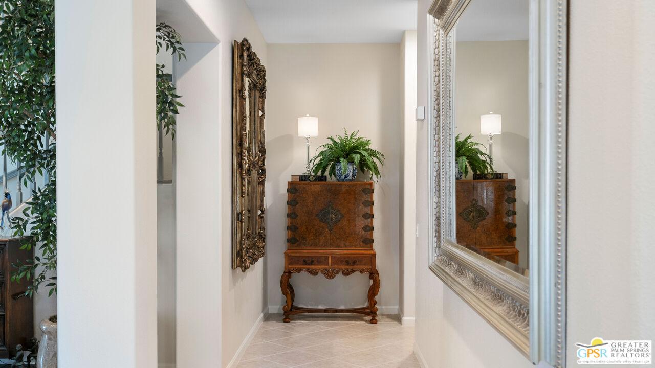 72 North Kavenish Drive Rancho Mirage, CA 92270 - Photo 40 of 73 a view of front door with a potted plant