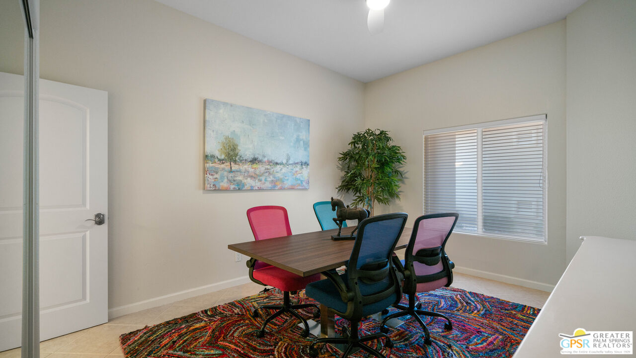 72 North Kavenish Drive Rancho Mirage, CA 92270 - Photo 46 of 73 a view of a dining room with furniture and wooden floor