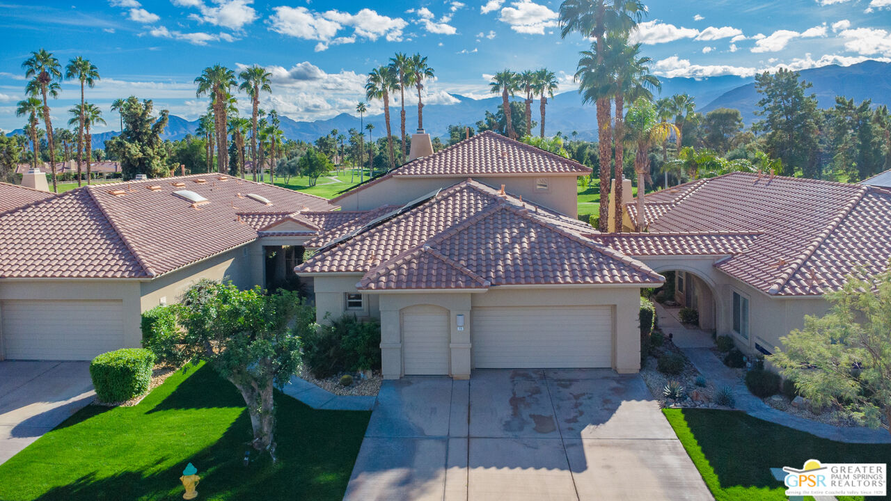 72 North Kavenish Drive Rancho Mirage, CA 92270 - Photo 50 of 73 a front view of a house with garden
