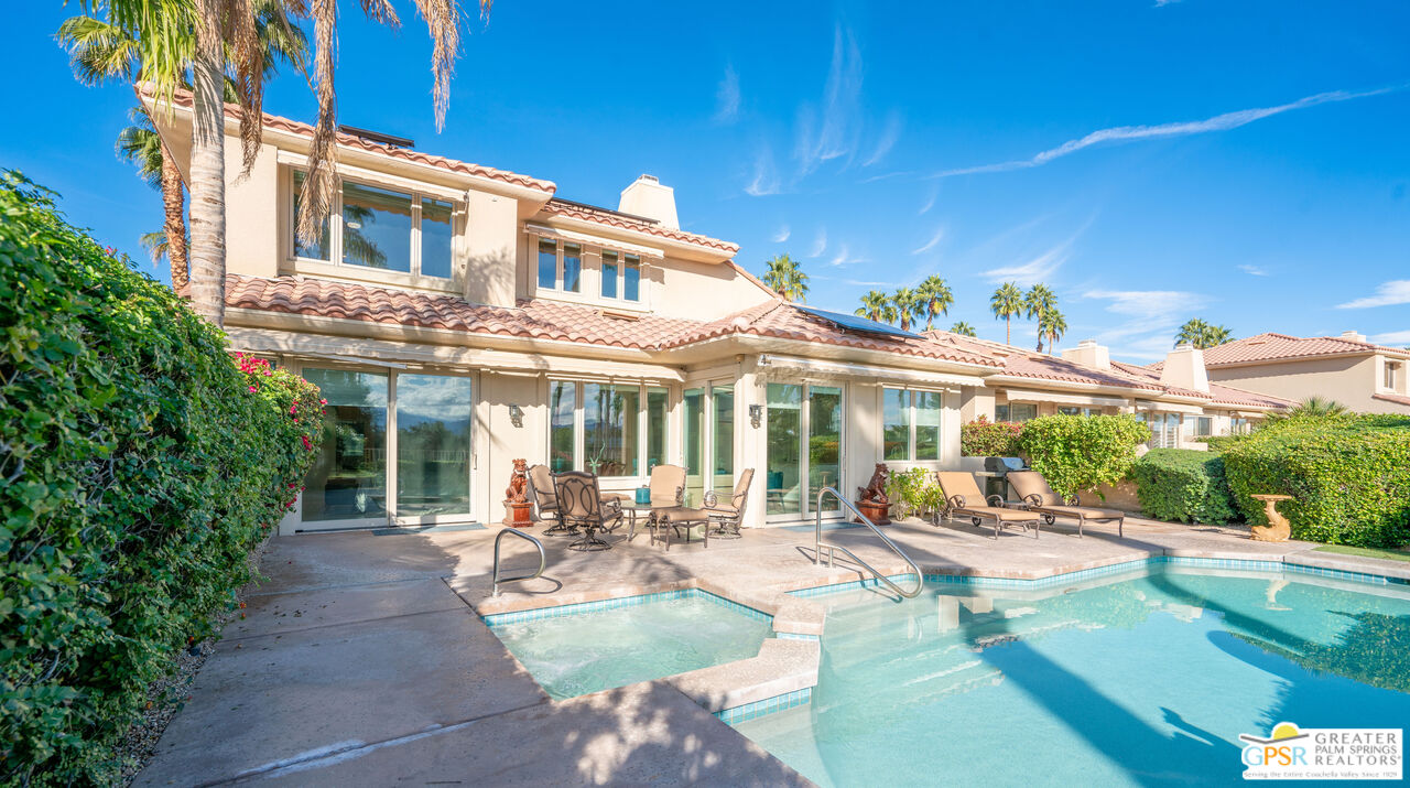72 North Kavenish Drive Rancho Mirage, CA 92270 - Photo 57 of 73 a view of a patio with couches table and chairs and potted plants
