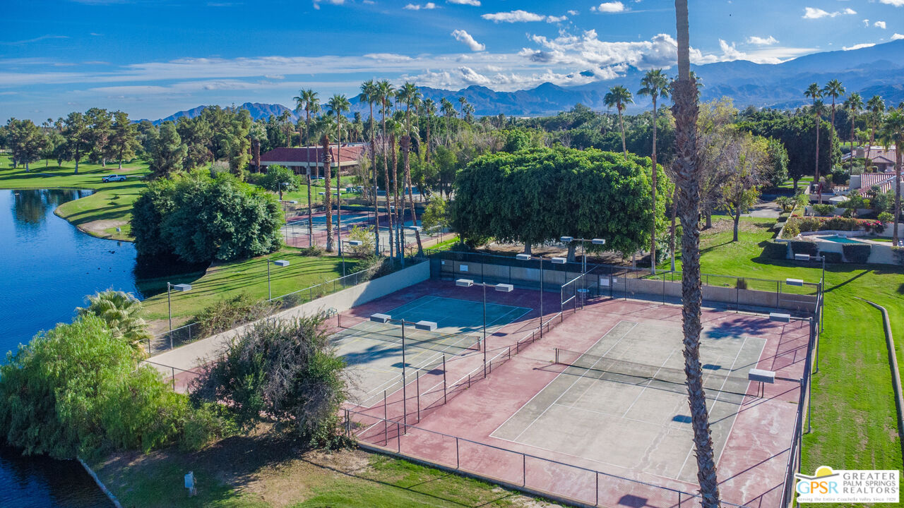 72 North Kavenish Drive Rancho Mirage, CA 92270 - Photo 69 of 73 a view of a swimming pool with a patio