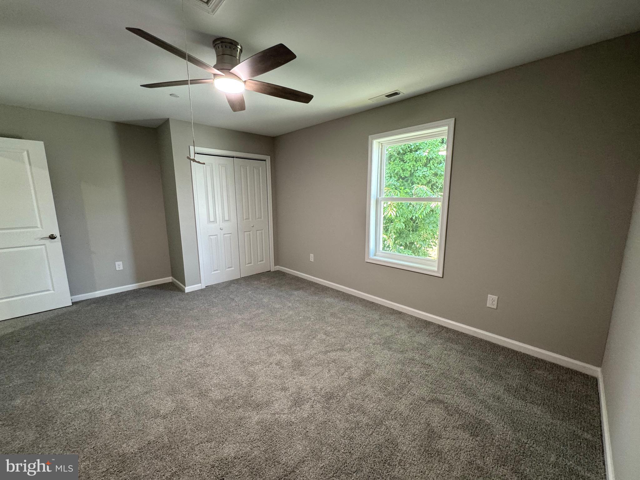 210 West 2nd Street Ridgely, MD 21660 - Photo 21 of 36 a view of an empty room with a window
