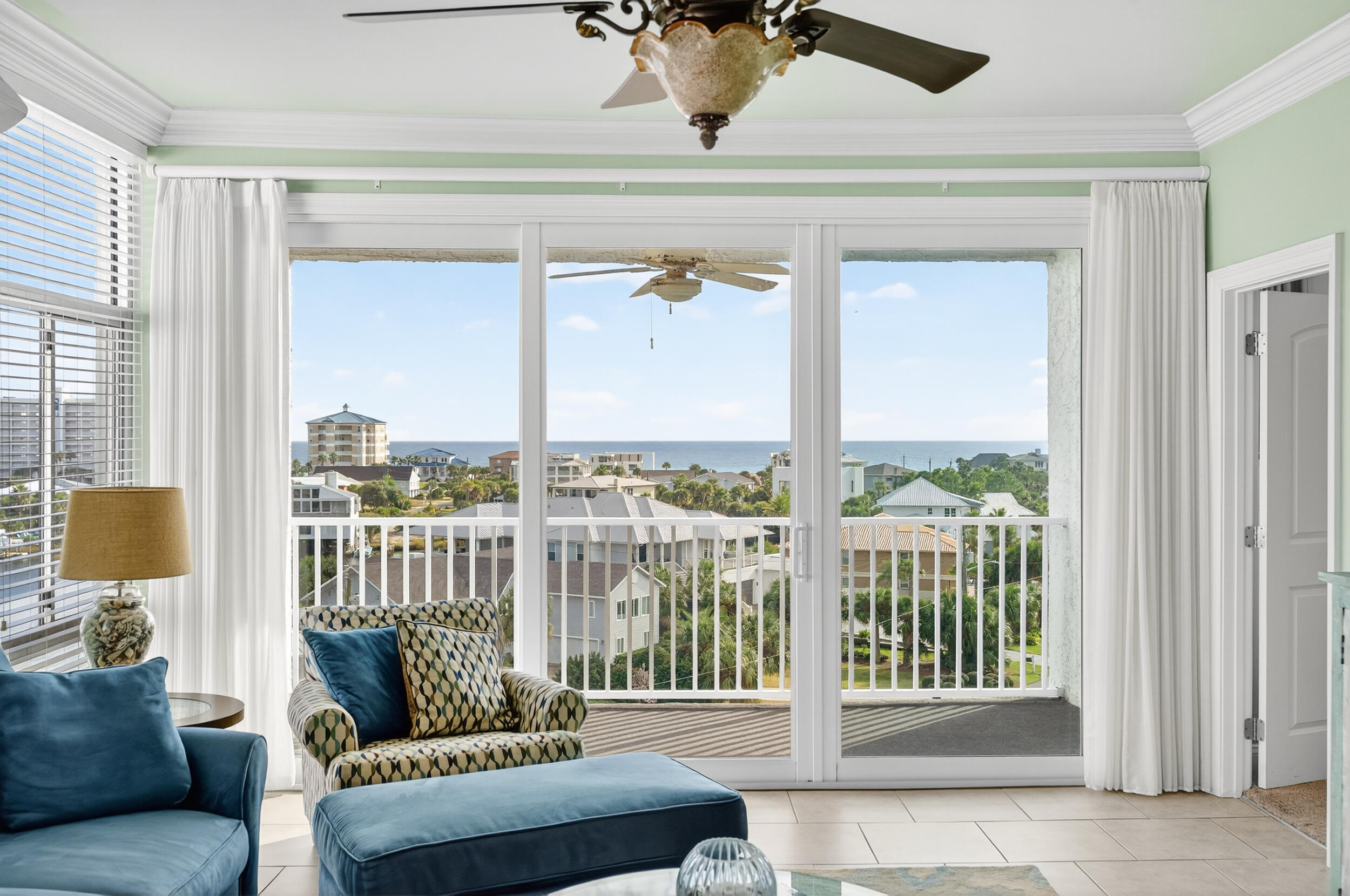 30 Moreno Point Road, Unit 702A Destin, FL 32541 - Photo 17 of 51 a view of a balcony with furniture