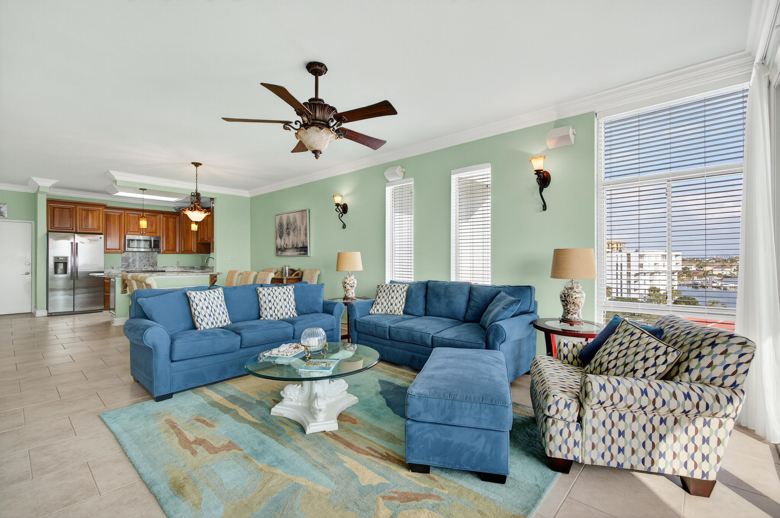 30 Moreno Point Road, Unit 702A Destin, FL 32541 - Photo 19 of 51 a living room with furniture and a large window