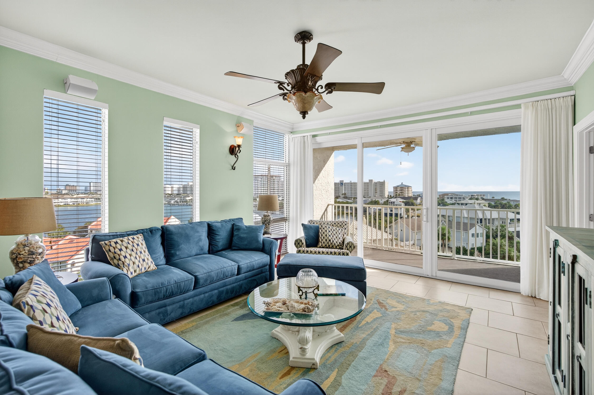 30 Moreno Point Road, Unit 702A Destin, FL 32541 - Photo 21 of 51 a living room with furniture and a large window