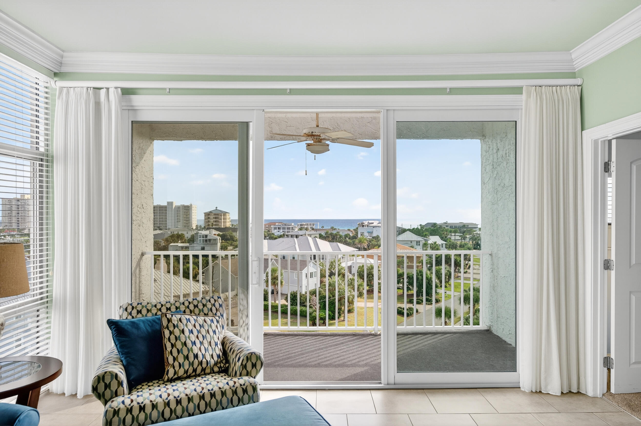 30 Moreno Point Road, Unit 702A Destin, FL 32541 - Photo 22 of 51 a view of a balcony with furniture