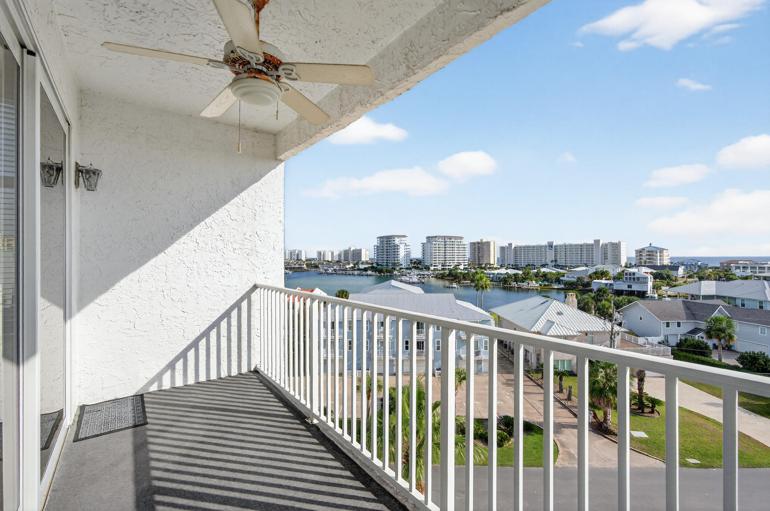 30 Moreno Point Road, Unit 702A Destin, FL 32541 - Photo 24 of 51 a view of a city from a balcony