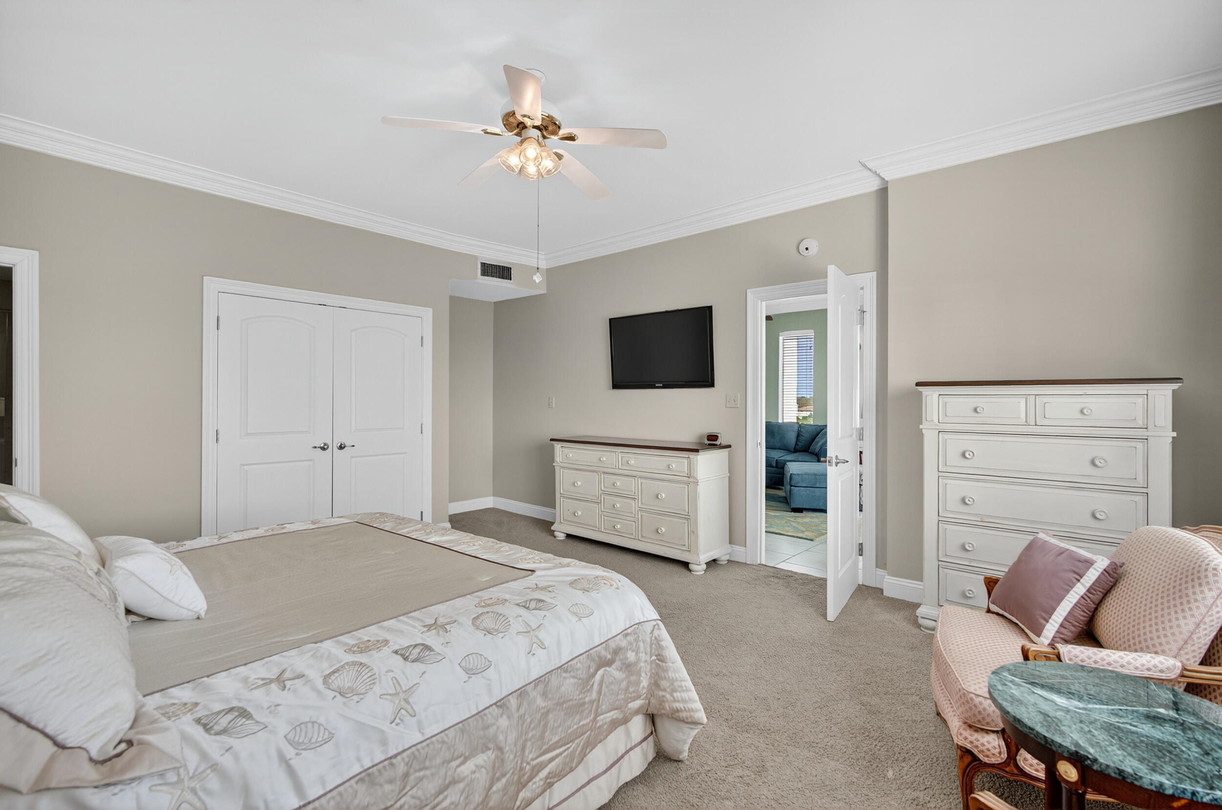 30 Moreno Point Road, Unit 702A Destin, FL 32541 - Photo 30 of 51 a bedroom with a bed and furniture