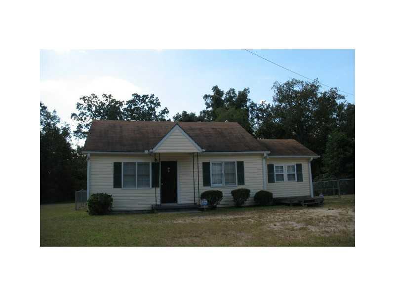 7419 Union Grove Road Lithonia, GA 30058 - Photo 1 of 1 Exterior Front. House sits on 3.7 acres.