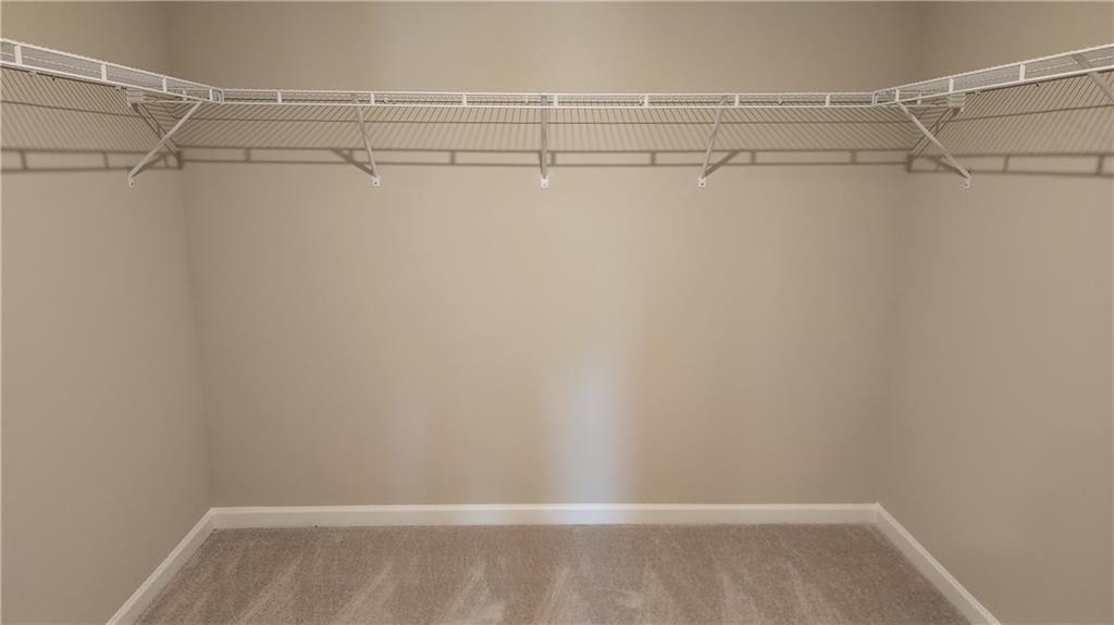 400 Grey Falcon Avenue Braselton, GA 30517 - Photo 23 of 31 a view of a room with racks on the wall