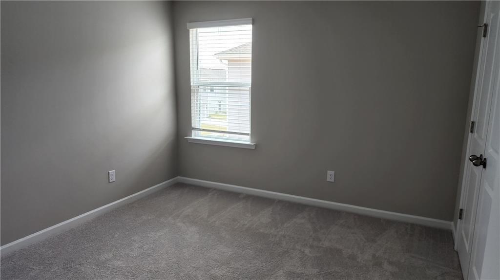 400 Grey Falcon Avenue Braselton, GA 30517 - Photo 28 of 31 an empty room with a window