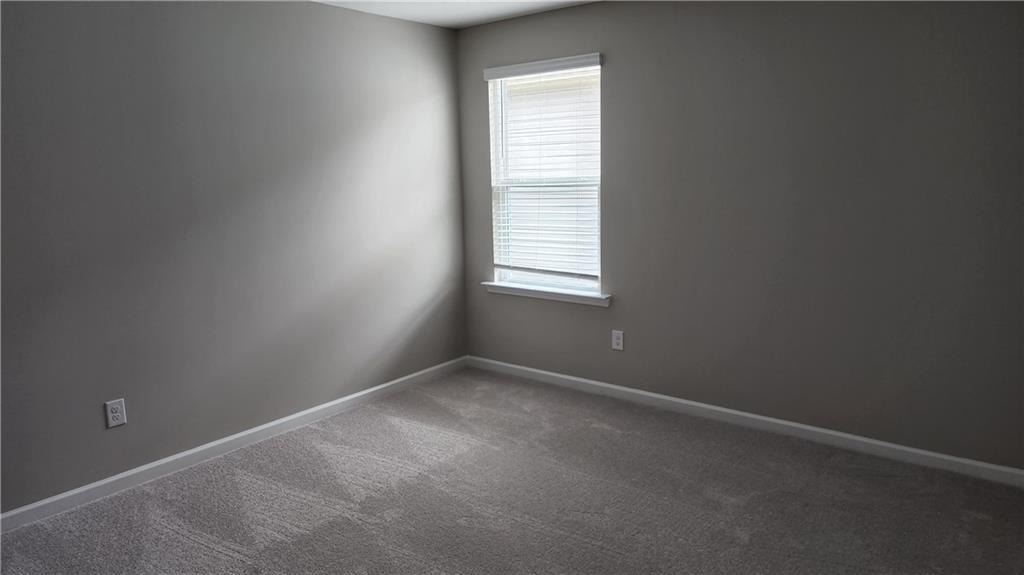 400 Grey Falcon Avenue Braselton, GA 30517 - Photo 30 of 31 an empty room with a window