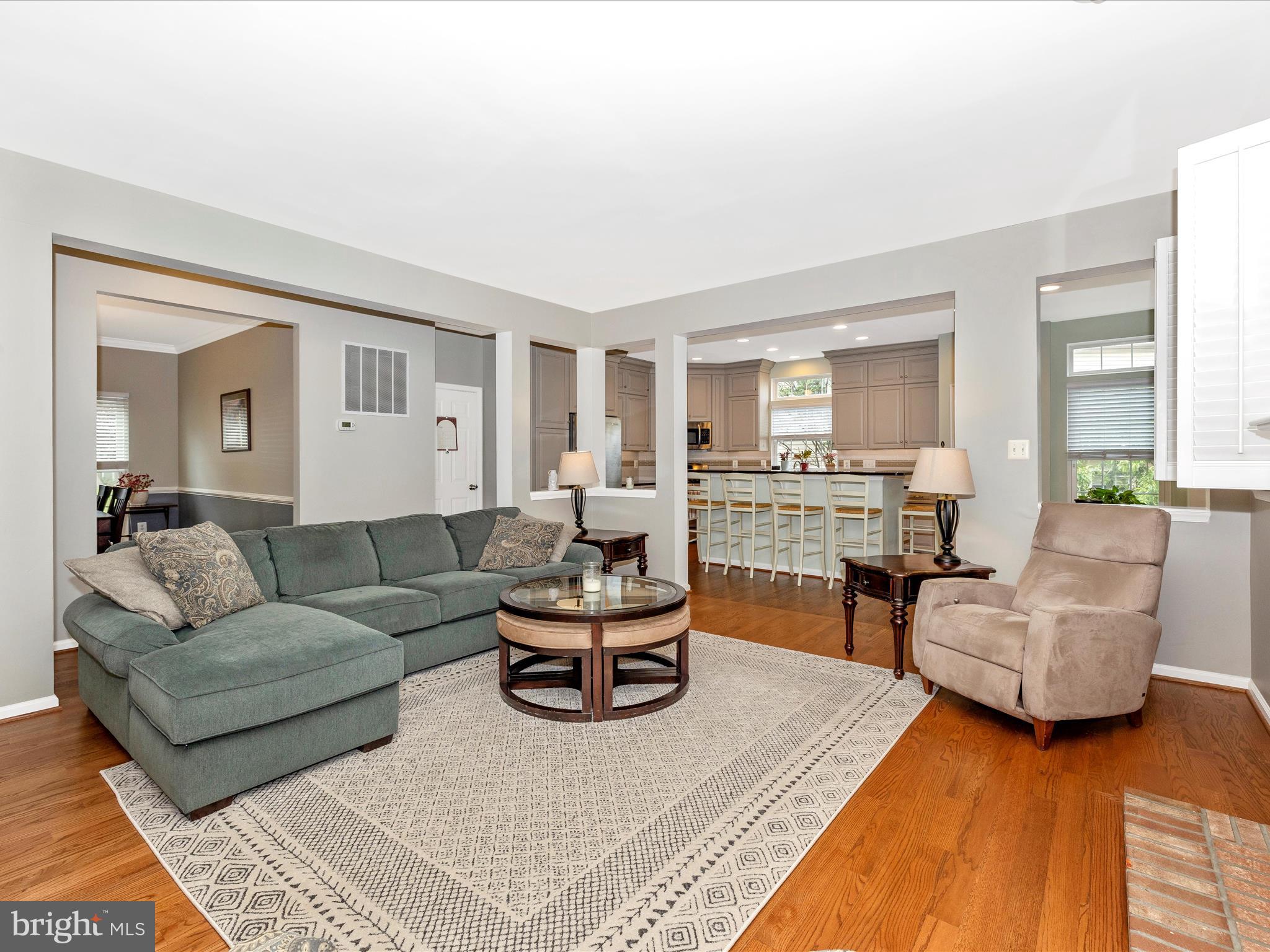 6470 Saddlebrook Lane Frederick, MD 21701 - Photo 15 of 74 a living room with furniture and a large window