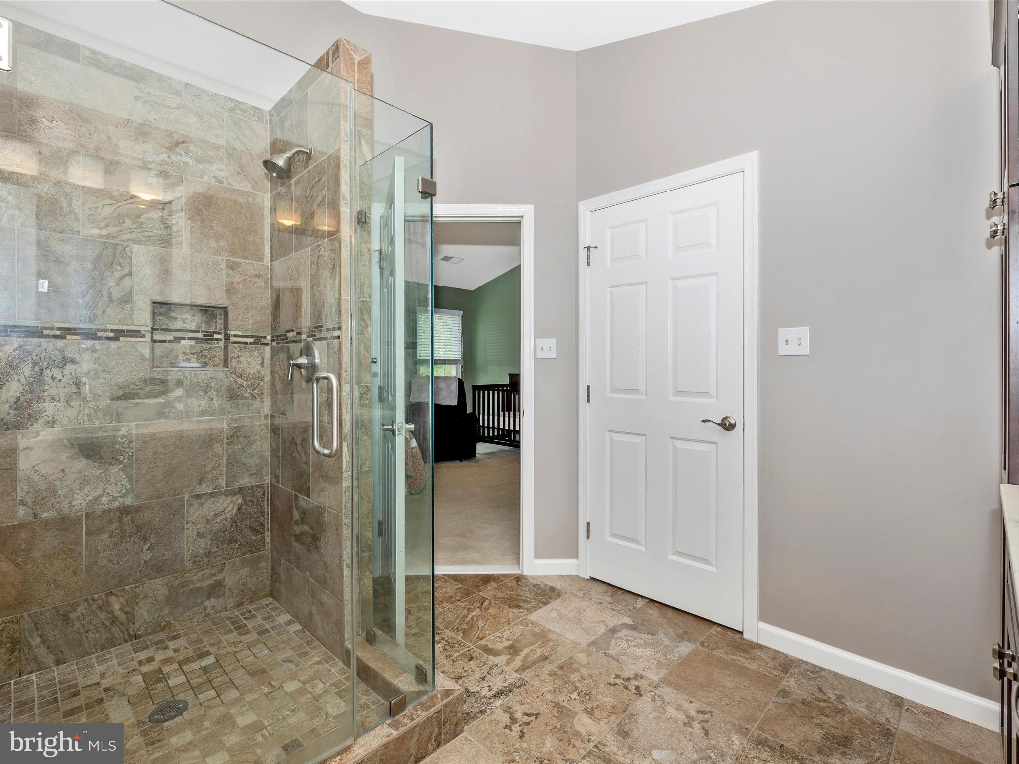 6470 Saddlebrook Lane Frederick, MD 21701 - Photo 30 of 74 a bathroom with a shower and a sink