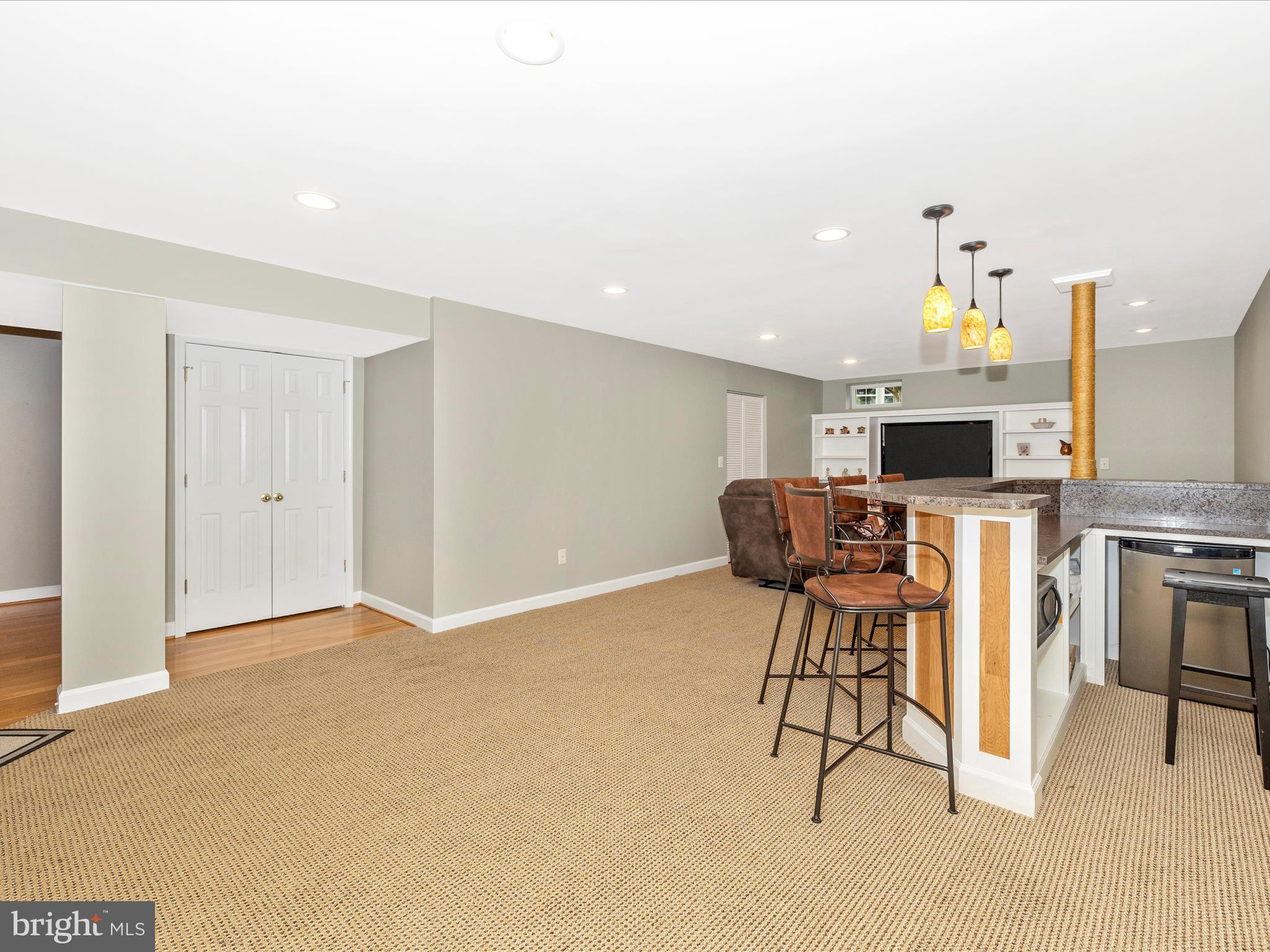 6470 Saddlebrook Lane Frederick, MD 21701 - Photo 37 of 74 a view of kitchen with furniture and flat screen tv