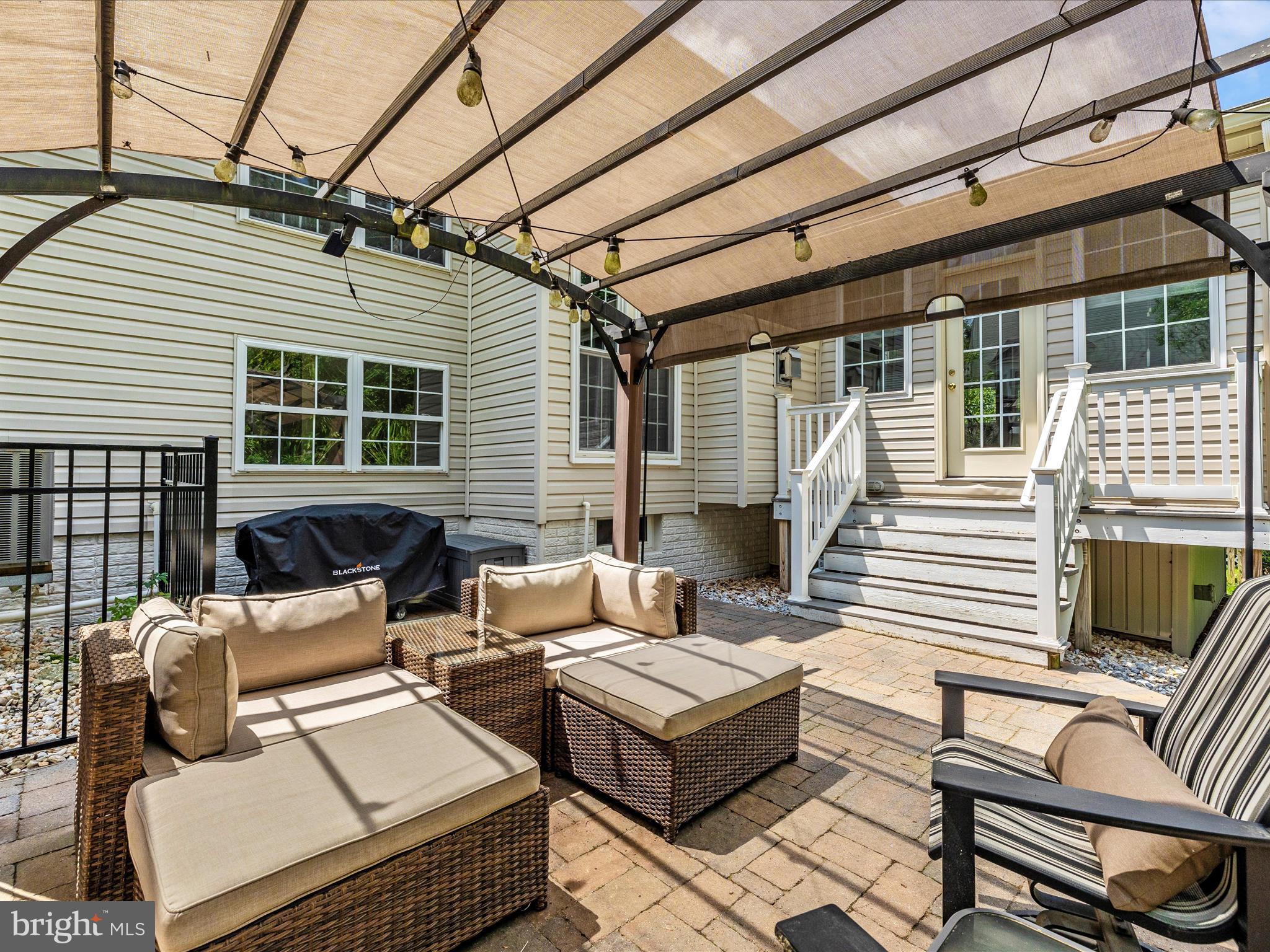 6470 Saddlebrook Lane Frederick, MD 21701 - Photo 56 of 74 a view of a patio with couches and pool