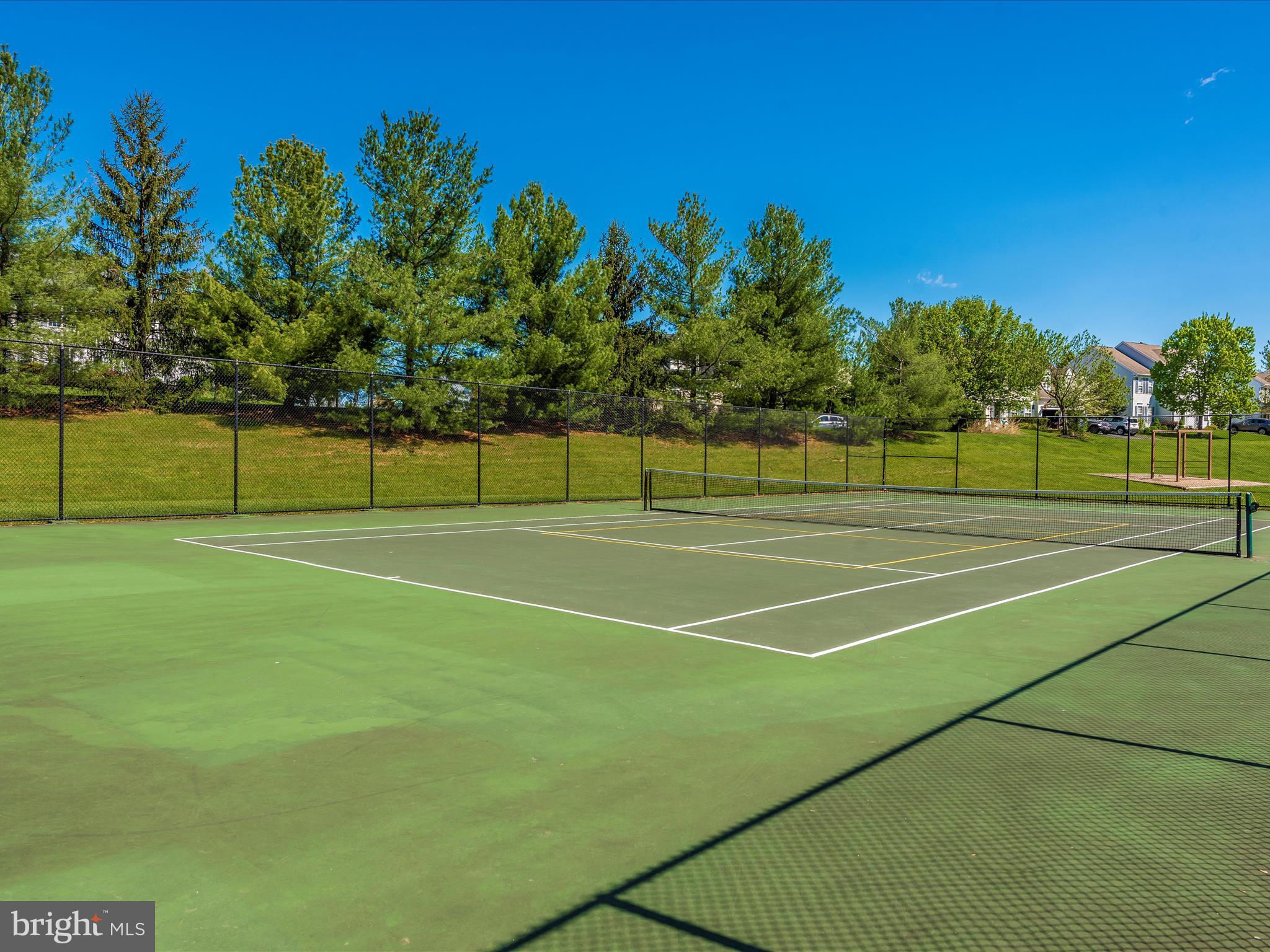 6470 Saddlebrook Lane Frederick, MD 21701 - Photo 70 of 74 a view of a tennis court