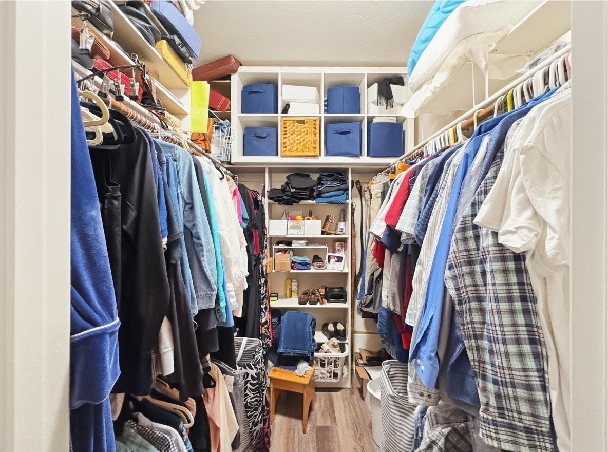 1033 East Irvine Road, Unit A Phoenix, AZ 85086 - Photo 21 of 26 a view of walk in closet with clothes and shoes