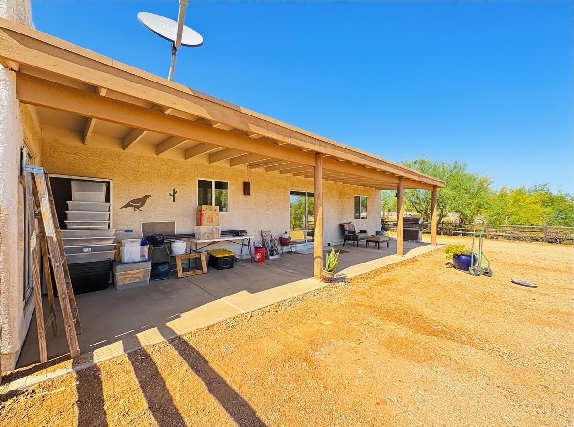1033 East Irvine Road, Unit A Phoenix, AZ 85086 - Photo 24 of 26 a view of a patio with swimming pool