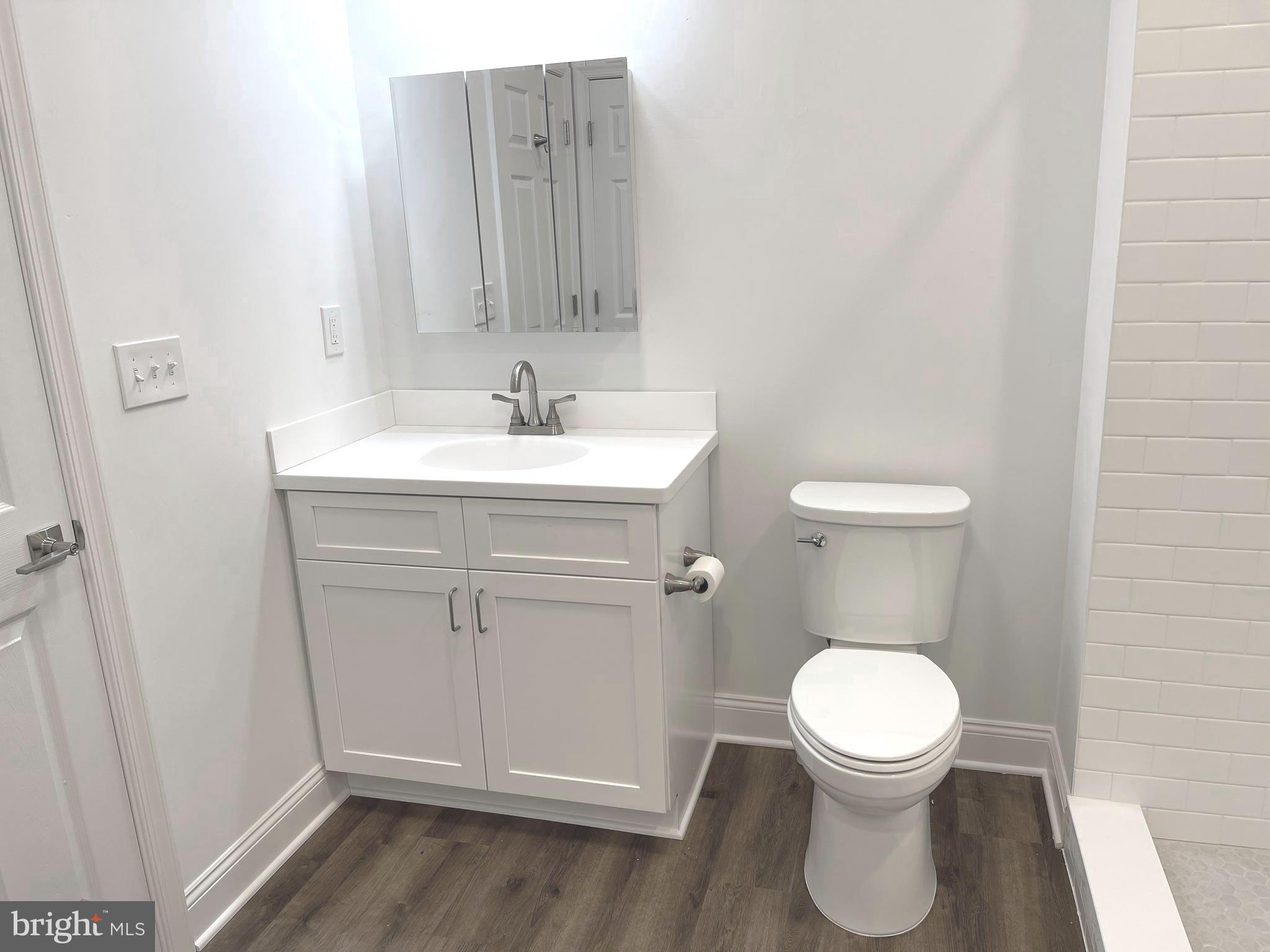 26 South State Street, Unit 2A Newtown, PA 18940 - Photo 12 of 18 Bathroom with hall and bedroom access