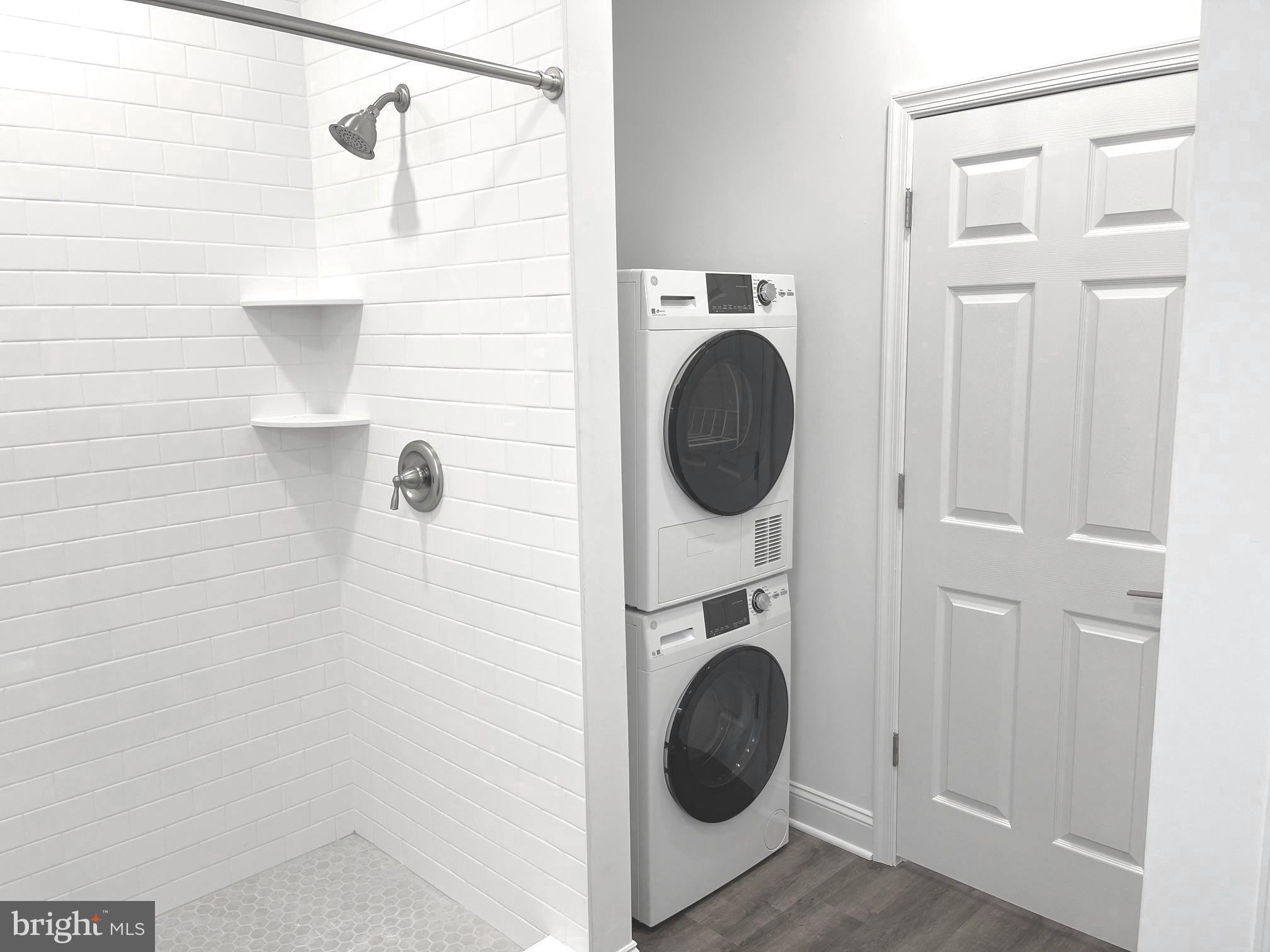 26 South State Street, Unit 2A Newtown, PA 18940 - Photo 14 of 18 Stacked washer & dryer and Hall entry