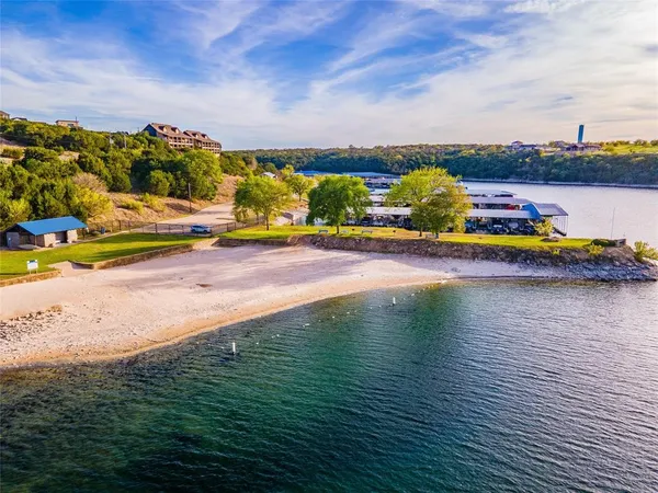 a view of a lake with a nearby beach