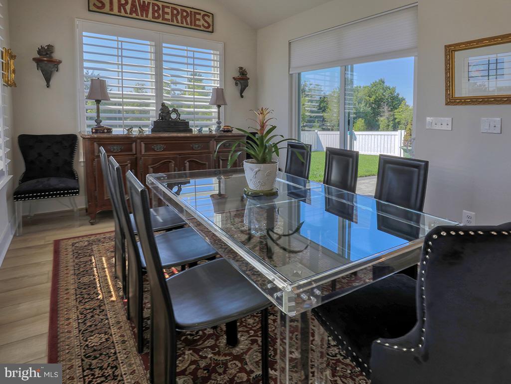 29298 Baker Island Road Lewes, DE 19958 - Photo 15 of 95 Dining room with access to backyard