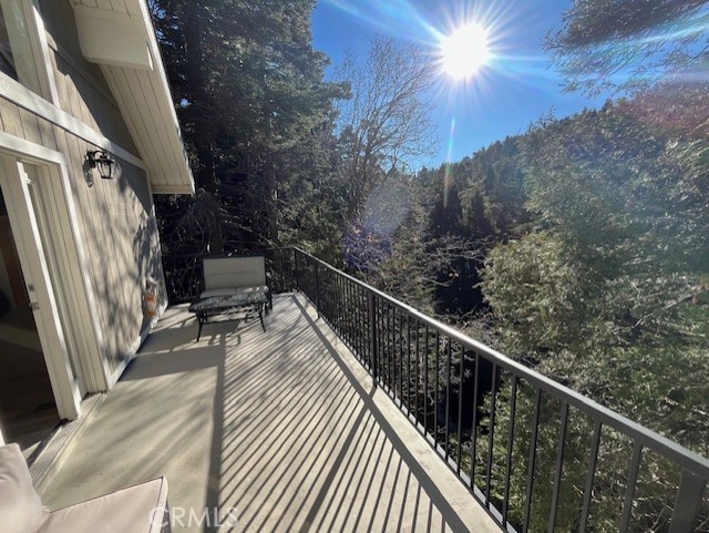 601 Sunderland Court Lake Arrowhead, CA 92352 - Photo 5 of 18 a view of balcony and wooden floor