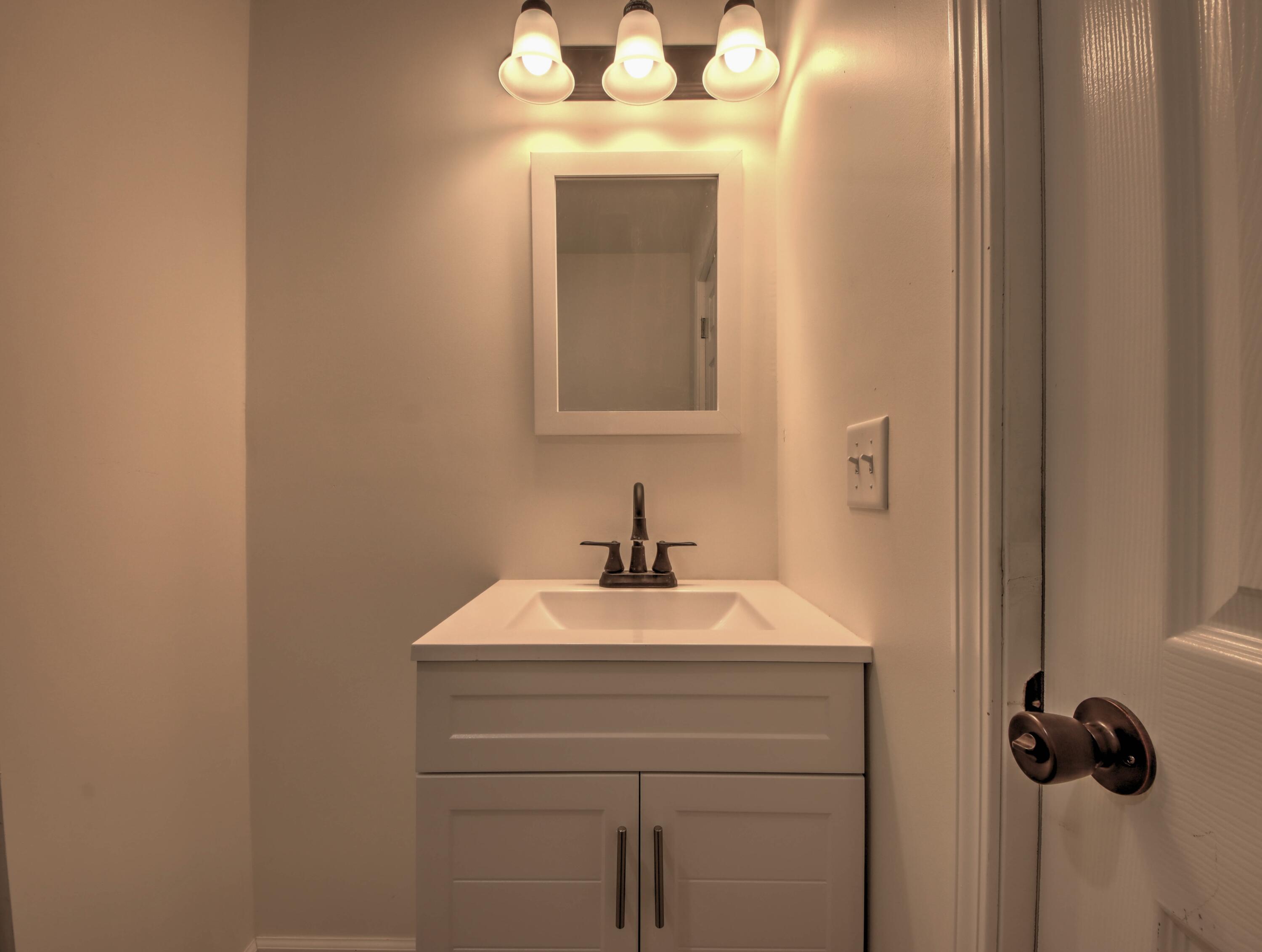 508 F Street La Porte, IN 46350 - Photo 19 of 52 a bathroom with a sink and a mirror