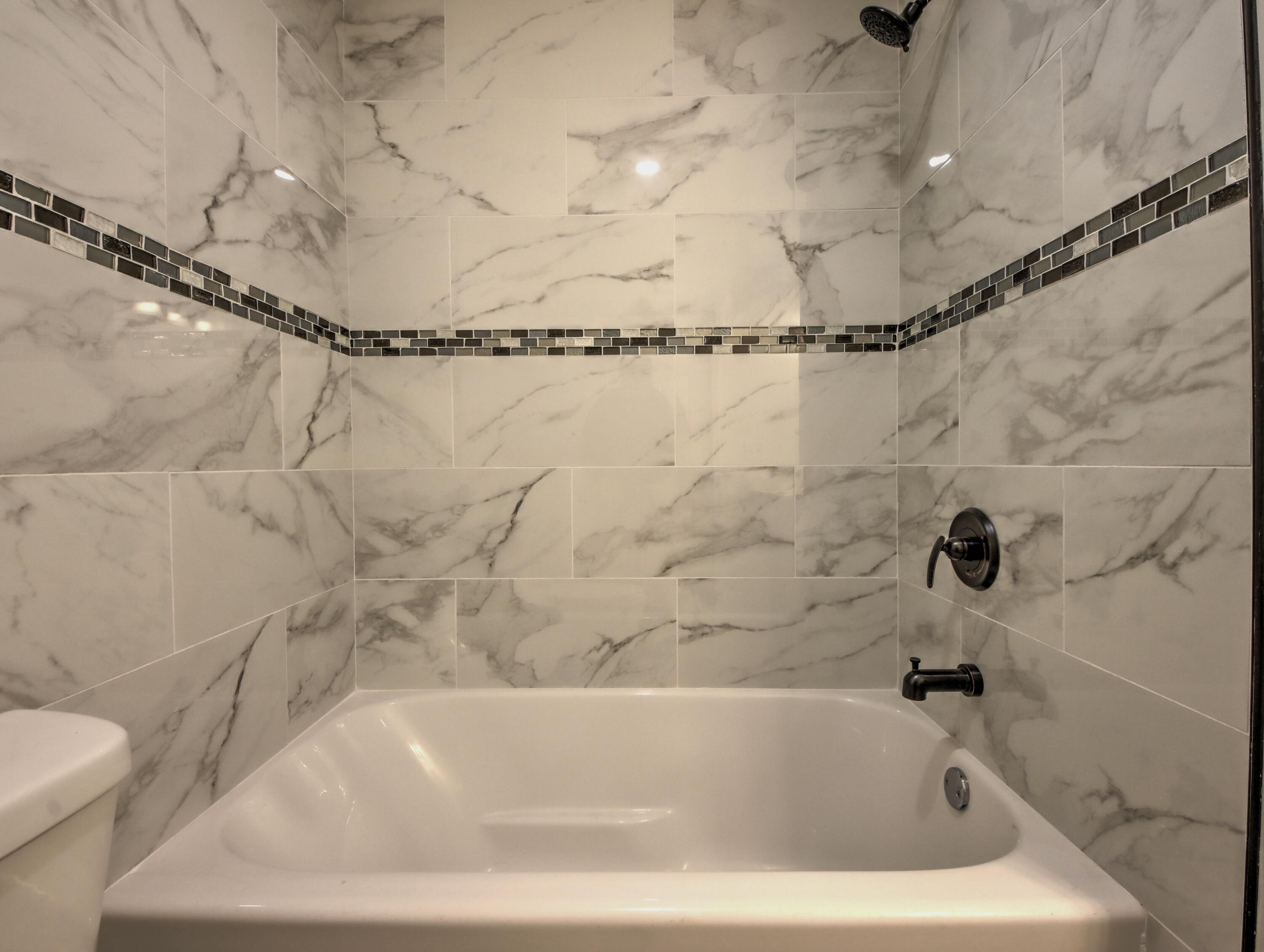 508 F Street La Porte, IN 46350 - Photo 20 of 52 a bathroom with a bathtub and shower