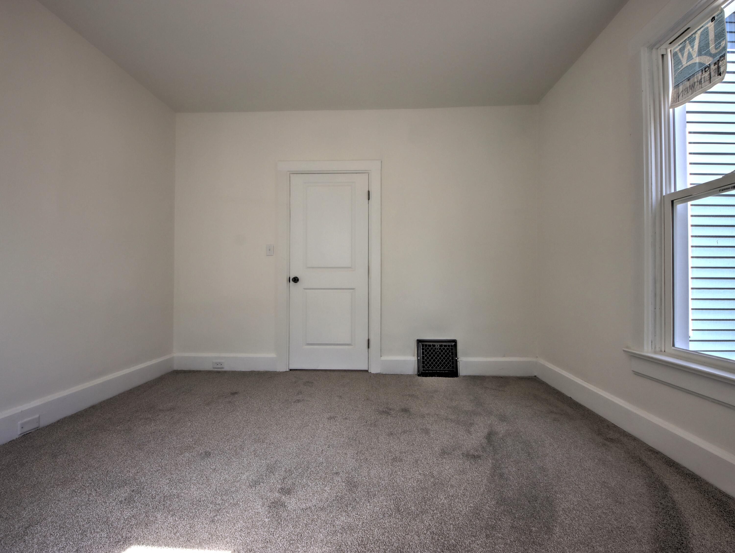 508 F Street La Porte, IN 46350 - Photo 21 of 52 an empty room with windows