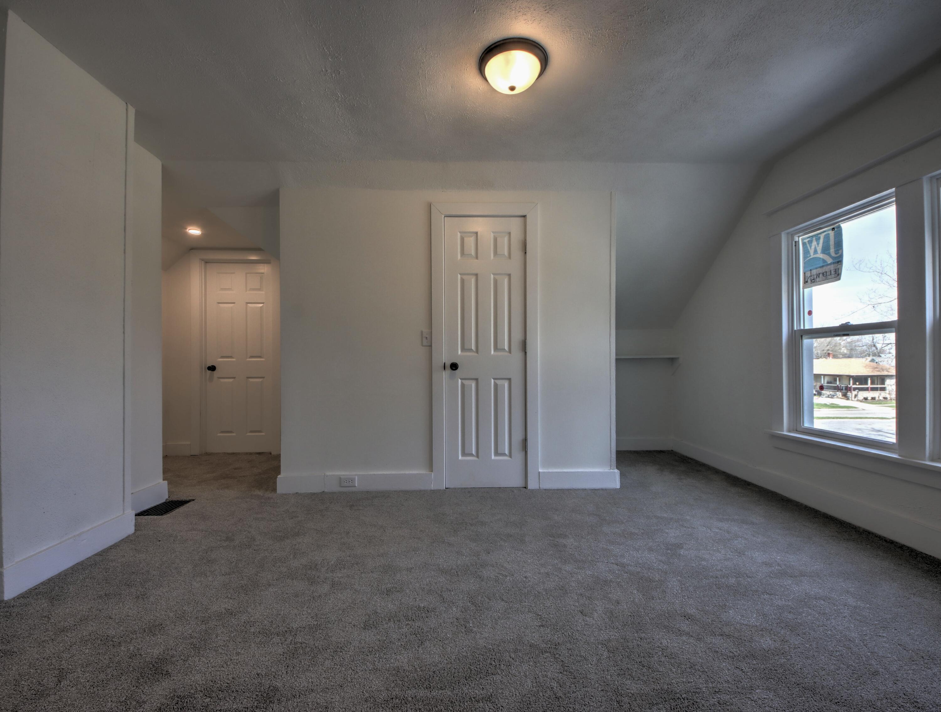 508 F Street La Porte, IN 46350 - Photo 32 of 52 an empty room with windows